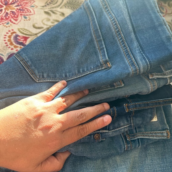 A lot of FIVE size 12 women’s jeans. Some still have tags on. - Picture 3 of 8